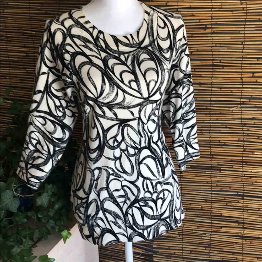 Sweater with button detail at sleeve